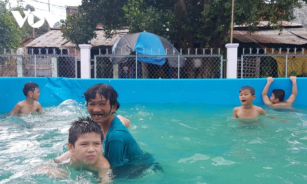 Local swimming coach honored by Forbes Vietnam