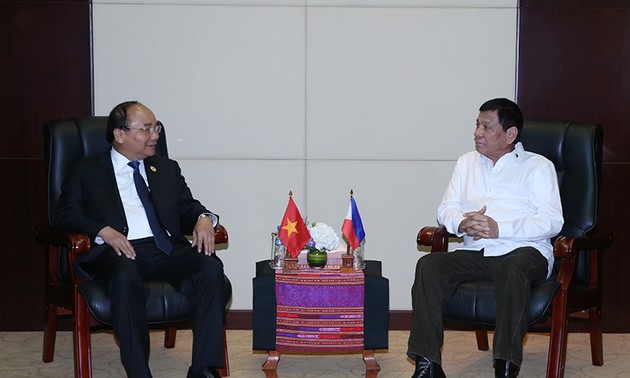 Dirigentes de Vietnam y Filipinas afirman apreciar la cooperación bilateral
