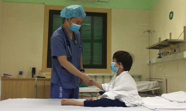7-year-old boy, Vietnam's youngest heart transplant recipient, goes home