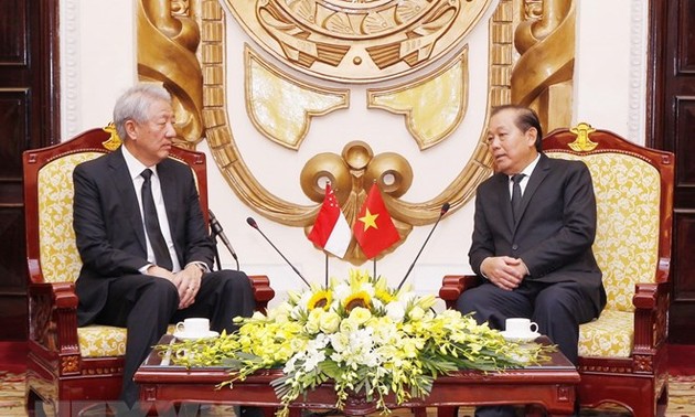  Phó Thủ tướng Thường trực Trương Hòa Bình tiếp Phó Thủ tướng Singapore 