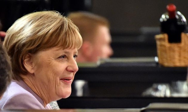 Merkel urges United States to continue international cooperation