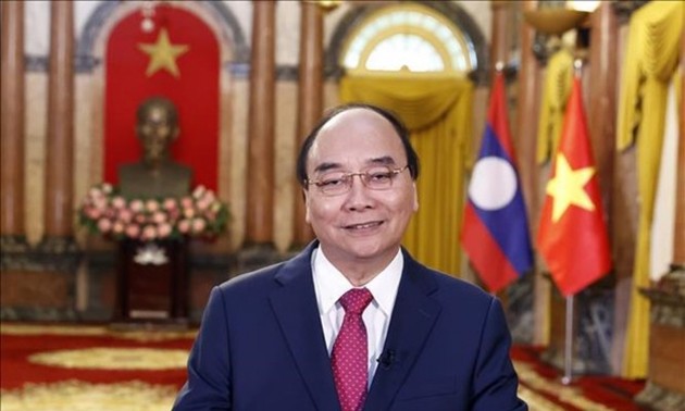 Presidents of Vietnam and Laos praise bilateral friendship 