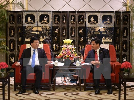 Чинь Динь Зунг встретился с секретарем парткома провинции Юньнань Ли Цзи Хэном 