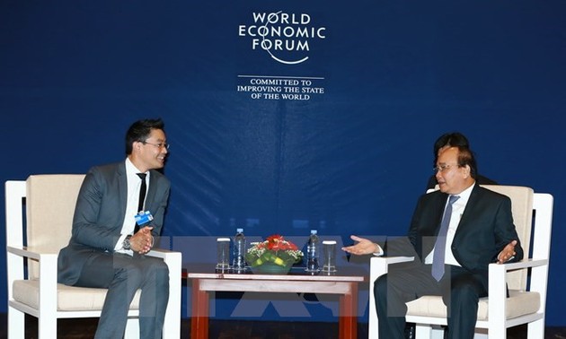 PM receives WEF, AIIB, Cisco leaders