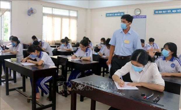 Final high school examination held in safe, serious manner