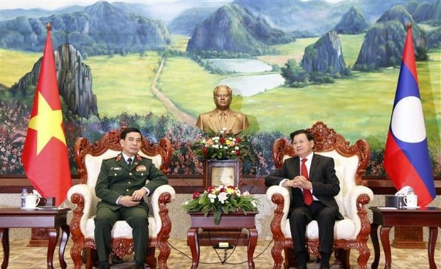 Lao leaders welcome visiting defense minister of Vietnam