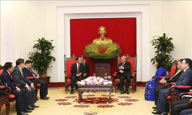 越共中央书记处常务书记陈国旺会见老挝中央纪委和国家监察署代表团