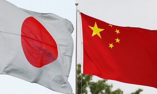 Top leaders of Japan, China affirm closer ties in first talks
