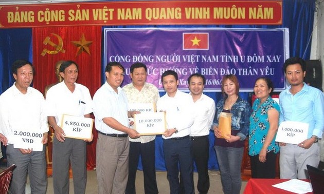 Laotian Vietnamese support island soldiers and civilians   
