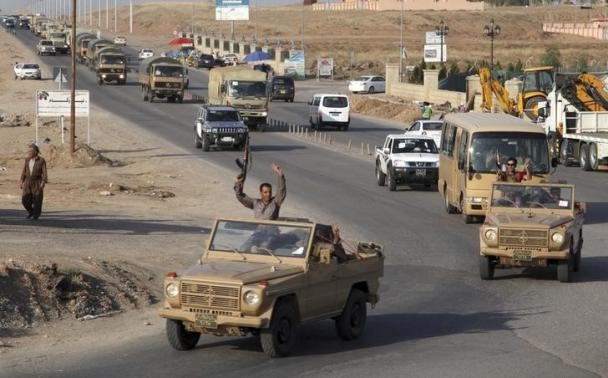 Iraqi Kurdish forces fight Islamic State in Syria