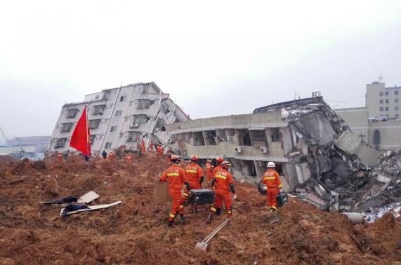 China landslide: Rescuers search for 91 people still missing