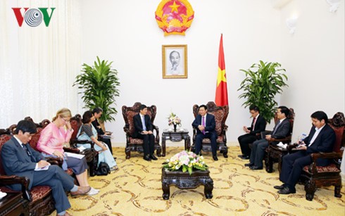越南政府副总理王庭惠会见联合国助理秘书长徐浩良