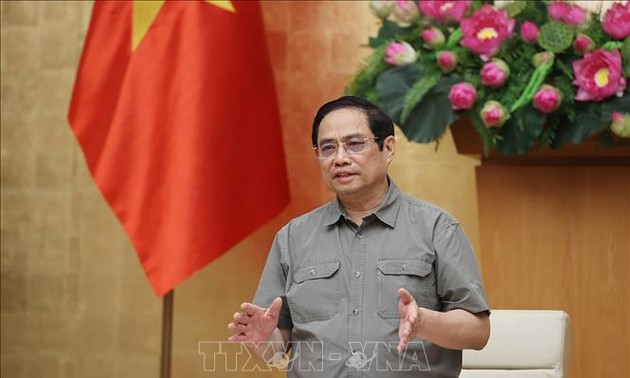 越南政府总理范明政：疫情防控不可掉以轻心 急于开放经营活动