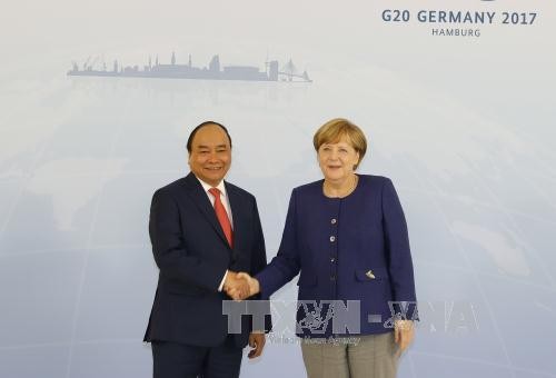 Premierminister Nguyen Xuan Phuc trifft Bundeskanzlerin Angela Merkel