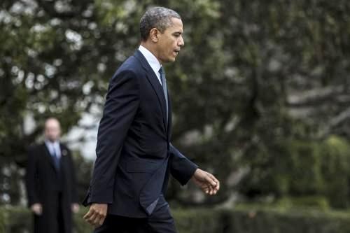 Barack Obama llega al lugar de la masacre donde murieron 27 personas