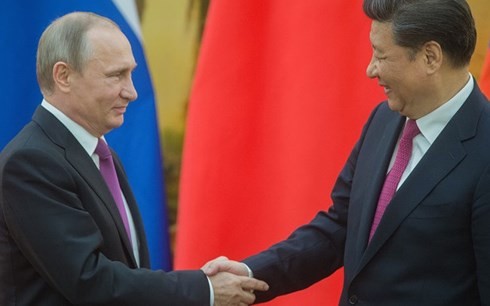 Putin: Russia prioritizes cooperation with China