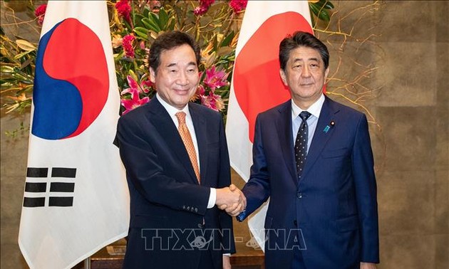 Commerce: Séoul et Tokyo conviennent de poursuivre les pourparlers 