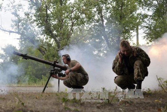 Poutine et Merkel demandent un cessez-le-feu immédiat en Ukraine