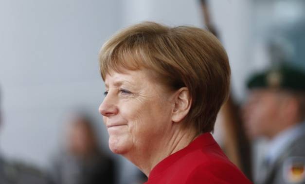 Merkel dit vouloir une coopération étroite avec Macron