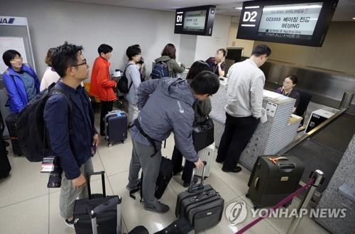 Quatre reporters sud-coréens se dirigent vers le site d'essais nucléaires de la RPDC