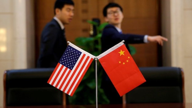 Washington et Pékin poursuivent le dialogue dans l'ombre des tarifs douaniers