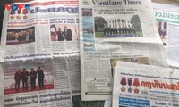 Pers dan Media Laos Tonjolkan Berita Kunjungan Persahabatan Resmi Ketua MN Vietnam di Laos