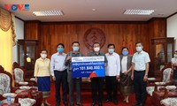Cộng đồng người Việt tại Lào cùng chính quyền sở tại phòng chống COVID-19 