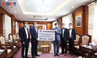 Doanh nghiệp Lào ủng hộ 1 triệu USD giúp Việt Nam chống dịch
