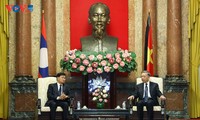 President To Lam receives Lao General Secretary and President Thongloun Sisoulith