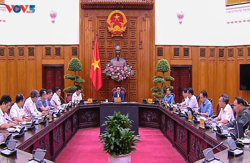 越南政府总理范明政要求确保生产经营活动的电力供应 - ảnh 1
