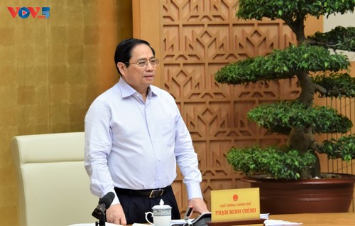 越南政府总理范明政主持与地方政府的在线会议 - ảnh 1
