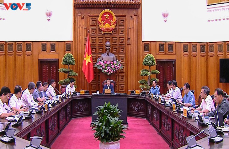 越南政府总理范明政要求确保生产经营活动的电力供应 - ảnh 1