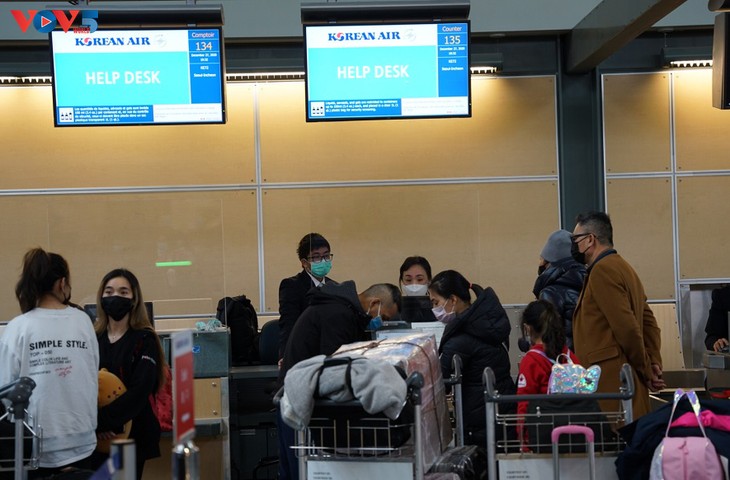 Thêm 355 công dân Việt Nam từ Canada về nước an toàn - ảnh 8
