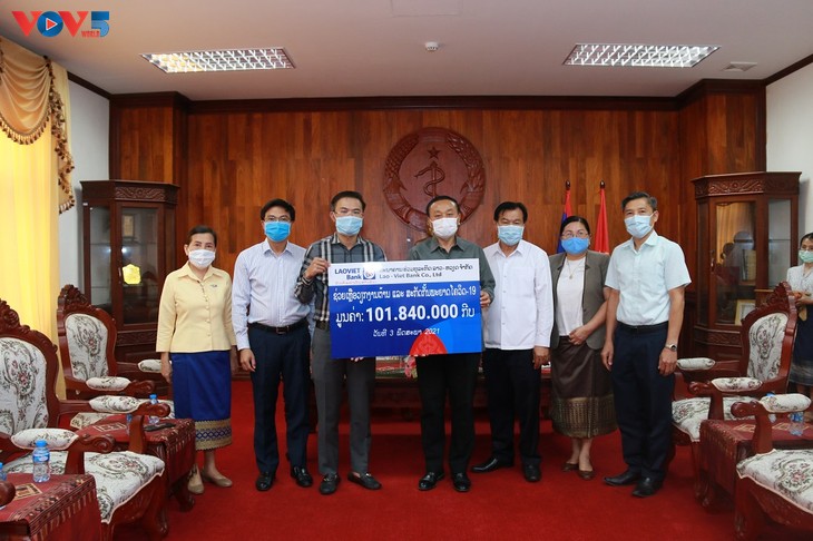 Cộng đồng người Việt tại Lào cùng chính quyền sở tại phòng chống COVID-19  - ảnh 2