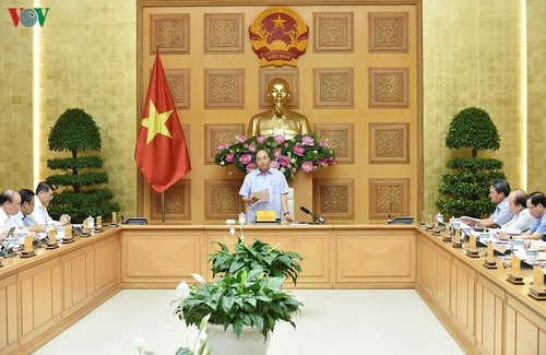 Jefe del Gobierno vietnamita alaba logros de la reestructuración bancaria - ảnh 1