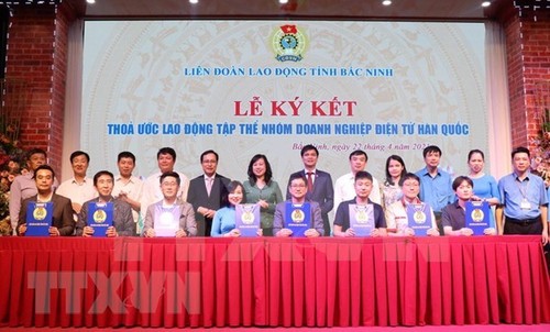 Firman convenio colectivo de trabajo entre empresas surcoreanas y trabajadores vietnamitas - ảnh 1