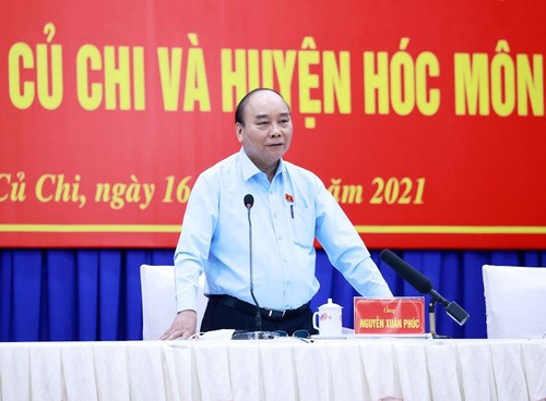 El jefe de Estado se reúne con electores distritales de Ciudad Ho Chi Minh - ảnh 1