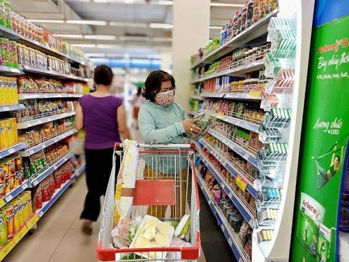 Medios y expertos internacionales reconocen los esfuerzos de Vietnam para contrarrestar la inflación en 2022 - ảnh 1