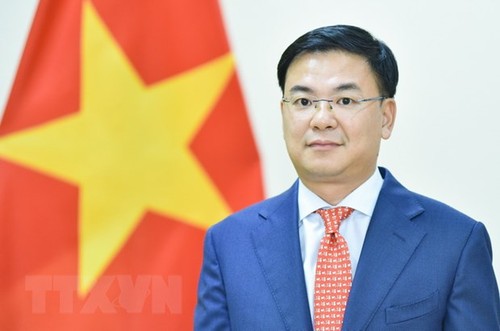 El viceministro de Relaciones Exteriores felicitan a los vietnamitas en el mundo con motivo del Tet 2023 - ảnh 1