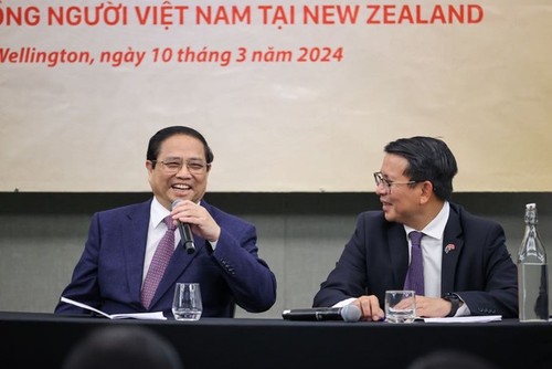 Primer ministro Pham Minh Chinh se reúne con vietnamitas residentes en Nueva Zelanda - ảnh 1