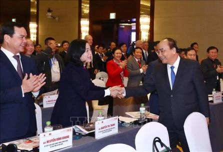 Premier de Vietnam asiste a Foro Económico de Vietnam 2019 - ảnh 1