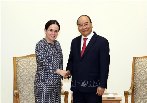 Primer ministro vietnamita recibe a altos funcionarios de Rumania y Austria - ảnh 1