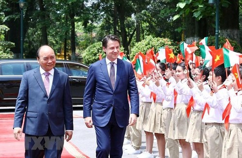 Primer ministro de Italia se reúne con su par vietnamita en visita oficial - ảnh 1