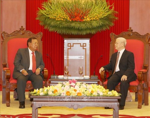Presidente de Vietnam recibe a homólogo laosiano - ảnh 1