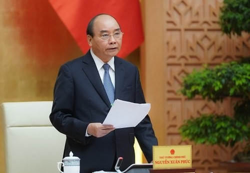 Premier vietnamita pide medidas efectivas para superar consecuencias de Covid-19 - ảnh 1