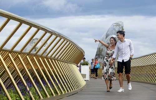 Puente Dorado de Da Nang, uno de los más bellos del mundo - ảnh 11
