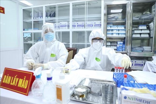 Buscan voluntarios para los segundos ensayos de la vacuna vietnamita anticovid-19  - ảnh 1