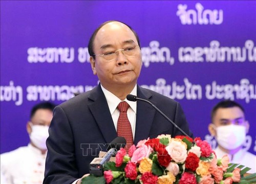 Presidente de Vietnam afirma impulsar relaciones de hermandad especial con Laos  - ảnh 1
