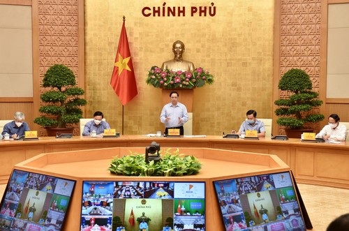 Premier vietnamita preside conferencia en línea sobre la situación epidémica en el país - ảnh 1