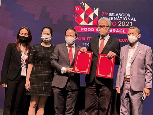 Dos empresas de té vietnamitas obtienen grandes contratos en la Exposición Internacional de Selangor 2021 - ảnh 1